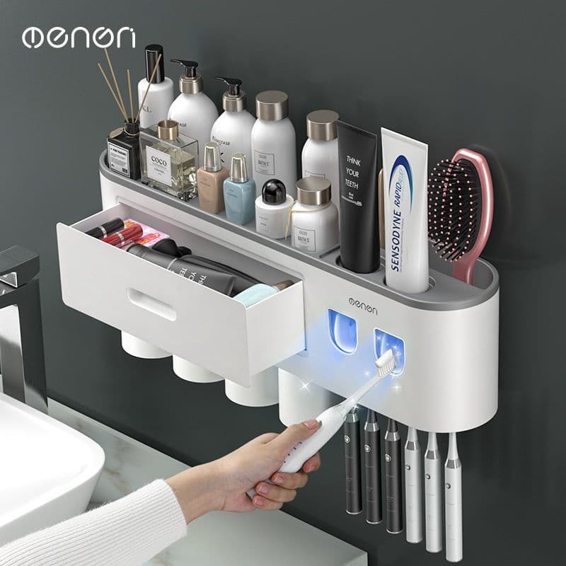 Toothbrush holder with UV light